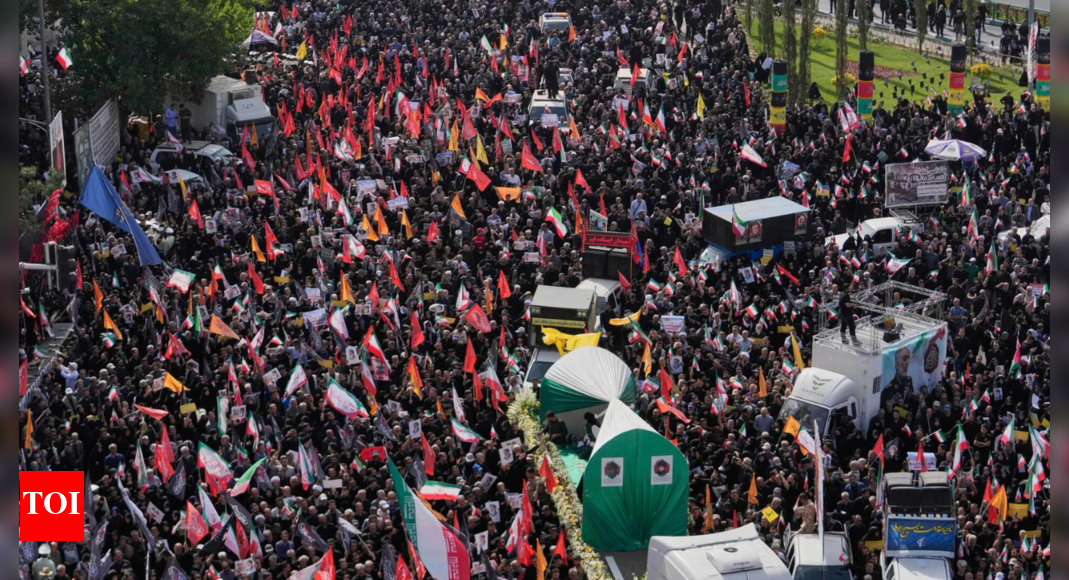 Iran buries top military commanders killed in Israel war; thousands join in ‘historic’ funeral – Video – Times of India