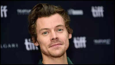 Harry Styles kisses a mystery woman at the Glastonbury Festival; the internet reacts with rage and shock - Deets Inside