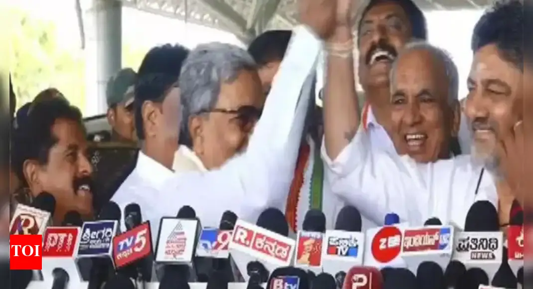 New CM in Karnataka? Mallikarjun Kharge gives ‘high command’ hint; Siddaramaiah-Shivakumar put up united front | India News – Times of India
