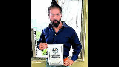 Strength coach sets Guinness World Record