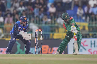 From 100/1 to 105/8! Bangladesh endure  melodramatic  illness  nether  lights arsenic  Sri Lanka seal stunning 77-run victory