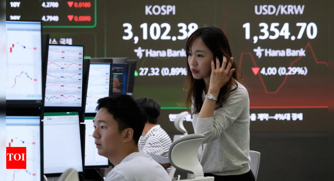 Asian stocks edge up as investors brace for US jobs data; oil slips on demand worries