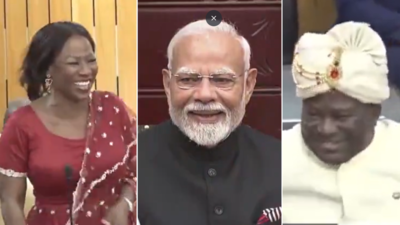 वॉच: घाना सांसदों का सम्मान पीएम मोदी को भारतीय पोशाक दान करके; संसद के लिए पगदी और बंधगला सूट पहनें