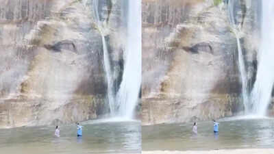  Swimmers narrowly escape falling boulders at Utah waterfall - video