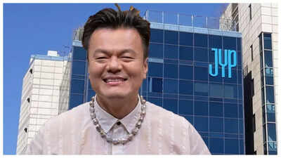 JYP's Bold Fashion Statement at Waterbomb 2025: A K-Pop Legend's Pink Vinyl Look