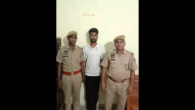 Key member of extortion gang held in city after firing incident