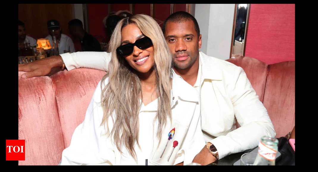 Russell Wilson and Ciara turn heads in Spain on their luxurious vacation as baby number five rumors continue to heat up