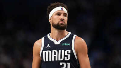Poolside romance brewing as Dallas Mavericks star Klay Thompson gets spotted in rapper Megan Thee Stallion's latest pictures
