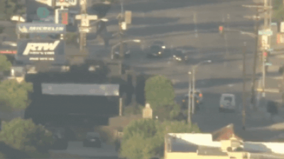 Los Angeles cop car chases stolen Mercedes; ends up in wild crash - watch