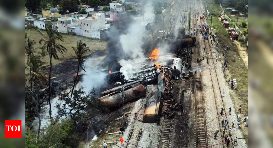 Spark in overhead equipment may have ignited fuel leaking from derailed wagon