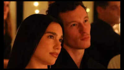 Dua Lipa and Callum Turner share an intimate moment at a music festival; the couple shine in casuals in London - Deets Inside