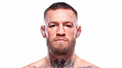 UFC legend Conor McGregor’s beach kiss with mystery woman triggers bold response from Dee Devlin