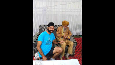 Glimpses of Fauja Singh’s fantastic run to finish line