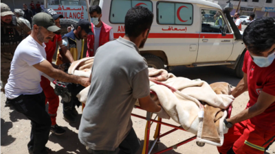Israel strikes in Damascus as clashes between government forces and Druze groups in Syria rage on