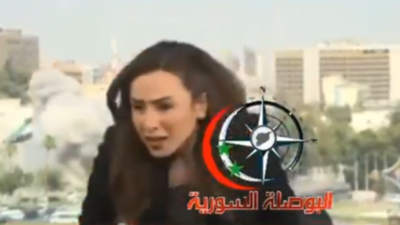  Israeli strike disrupts live broadcast amid hits to Damascus TV building; anchor runs off