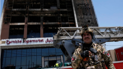 Officials try to identify 18 bodies in deadly Iraq shopping mall fire