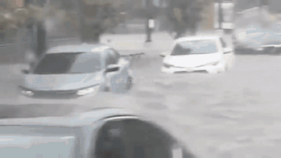 Watch: Flash floods submerge vehicles as heavy rain lashes Washington DC;  rescue ops under way - Times of India