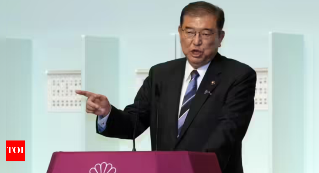 Japan PM hangs on after election debacle