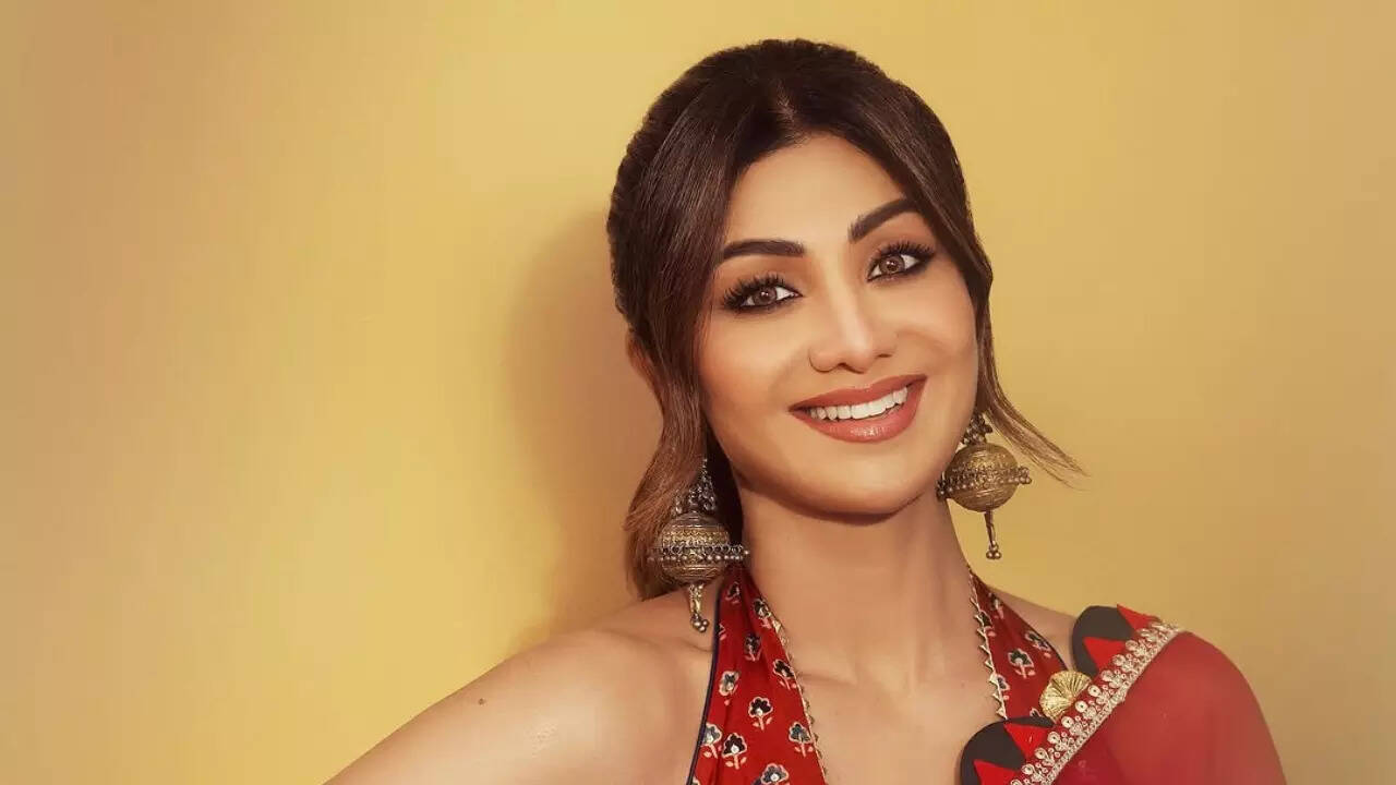 A playful smile hinting at deeper secrets