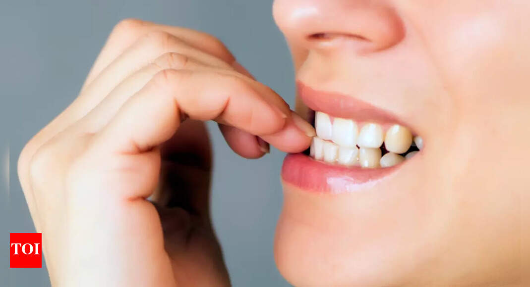 Not just nerves; the positive aspects of nail biting! | – Times of India