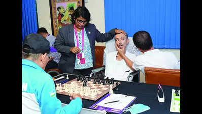 Moving chess pieces with just his eye, Abbas wins hearts, games with a smile