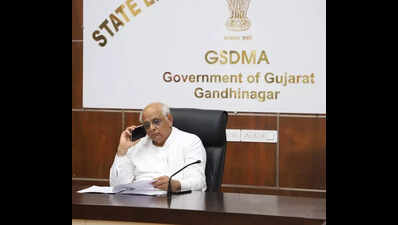 Gujarat CM visits SEOC, reviews rain situation