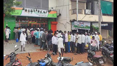 Koppal ryots camp outside fertiliser centre to collect urea