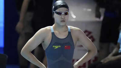12-year-old Chinese swimmer turns heads but how young is too young in professional sport?