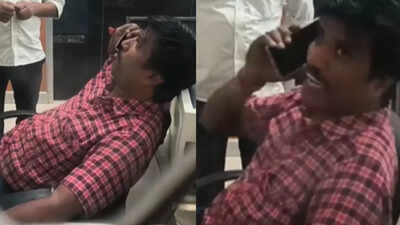 Watch: Railway clerk makes passengers wait for 15 minutes while chatting on  phone; suspended | Bengaluru News - Times of India