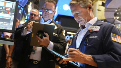 US market today: Microsoft, Meta earnings lift Nasdaq to record level; inflation uptick dims Fed rate cut hopes