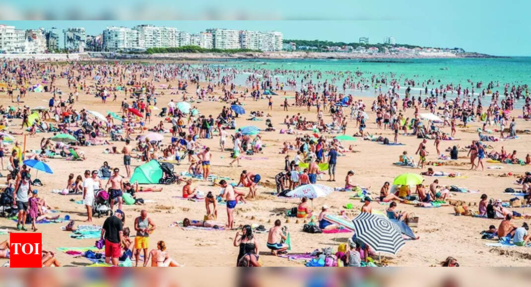 A French beach town's plea to tourists: Keep your clothes on in markets