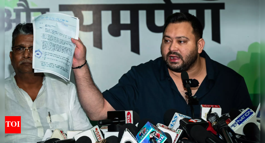 Tejashwi's dual voter ID row: EC issues notice to RJD leader, asks him to hand over EPIC card