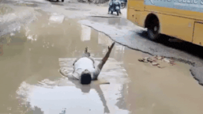 Man protests pothole mishap with bizarre demonstration