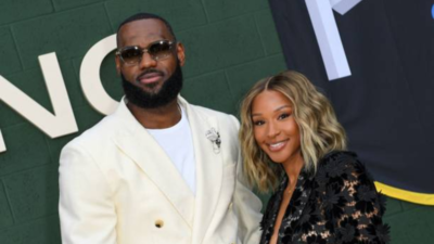 LeBron James joins Savannah James in Pilates session after workout in front of Los Angeles Clippers banner