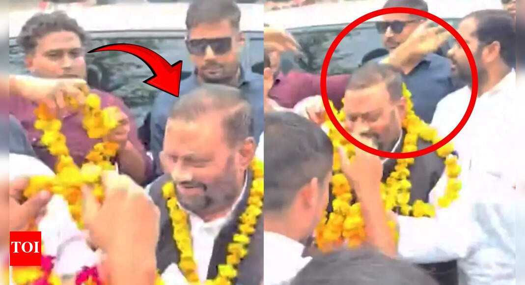 Watch: Karni Sena worker tries to slap Swami Maurya in Fatehpur; arrested