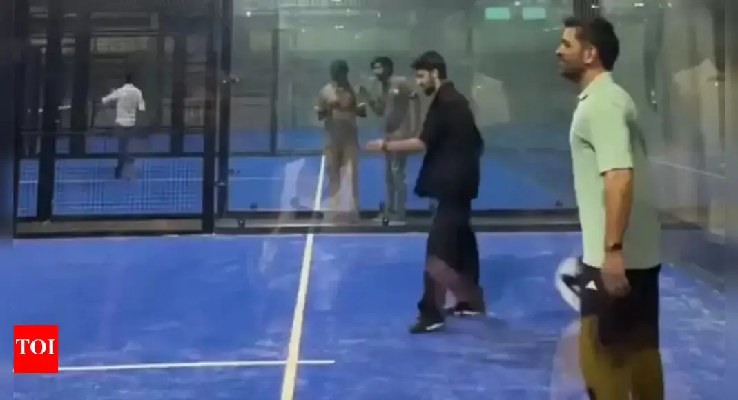 ‘Captain Cool meets Music Sensation’: Viral video of MS Dhoni playing padel with Anirudh steals the show – Watch | Cricket News – Times of India