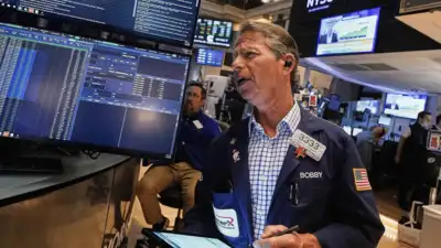 Photo credit- AP US market today: S&P 500, Nasdaq slip from peaks; Dow down 104 points after hot inflation data