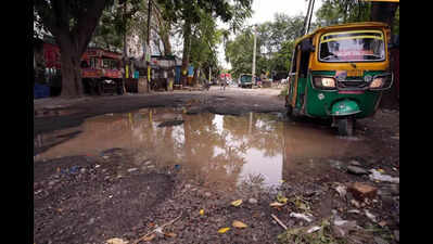 Road crumbles, riddled with craters, commute a nightmare in Udyog Vihar