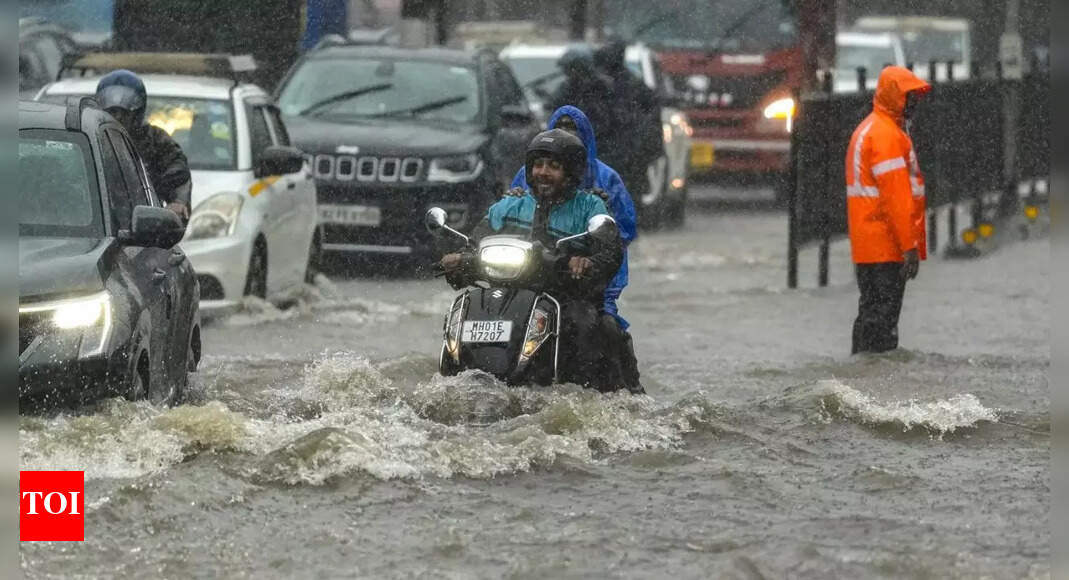 Mumbai Hit by Heavy Rains, Flooding Roads and Rail Tracks