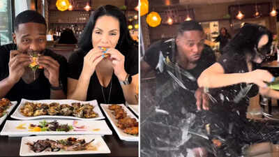  Car crashes into a restaurant while US food vloggers were eating a meal and filming