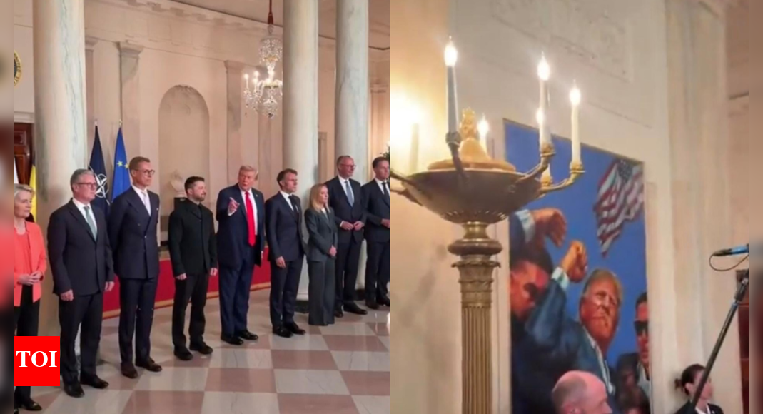 ‘Not a great day’: Donald Trump displays artwork of Butler attack to European leaders - video
