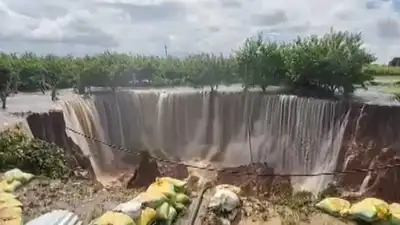 Rajasthan rain havoc: Overflowing dam creates huge crater in Sawai Madhopur; villages submerged, roads washed out, people stuck on rooftops