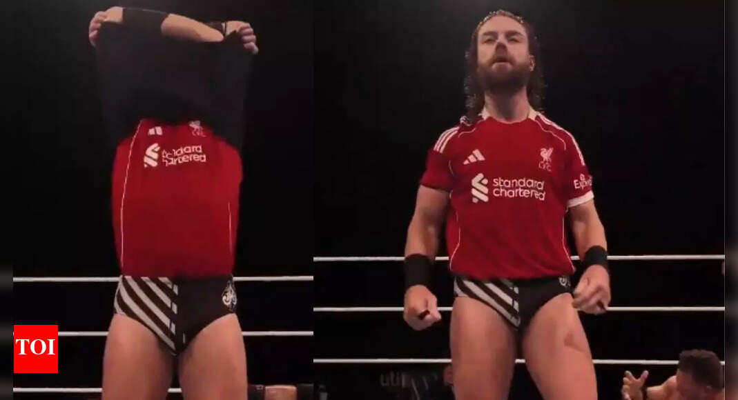 Watch: WWE Wrestler unveils Liverpool jersey in ring - the name on back stuns fans