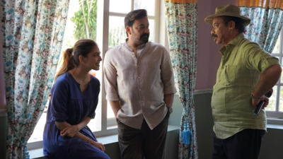  Malavika Mohanan shares BTS pics with Mohanlal and Sathyan; writes, 'Still pinching myself'