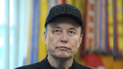 Elon Musk targets Microsoft on Twitter, user replies; Tesla CEO joins in with …