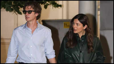 Andrew Garfield and Monica Barbaro arrive hand-in-hand in Venice; the couple exudes chic and elegance