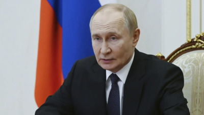 Putin (File photo) 'Discriminatory': Putin blasts Western sanctions against Russia; hints at deeper ties with China ahead of visit