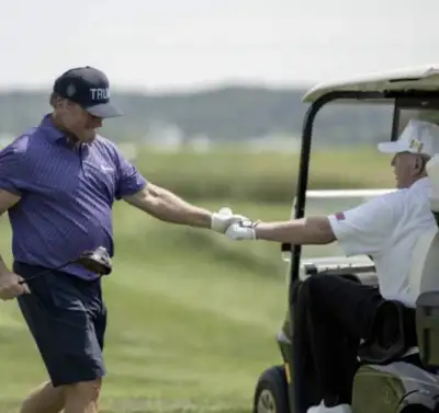 Where’s Donald Trump? Mystery ends as he reappears playing golf with ex NFL Coach Jon Gruden