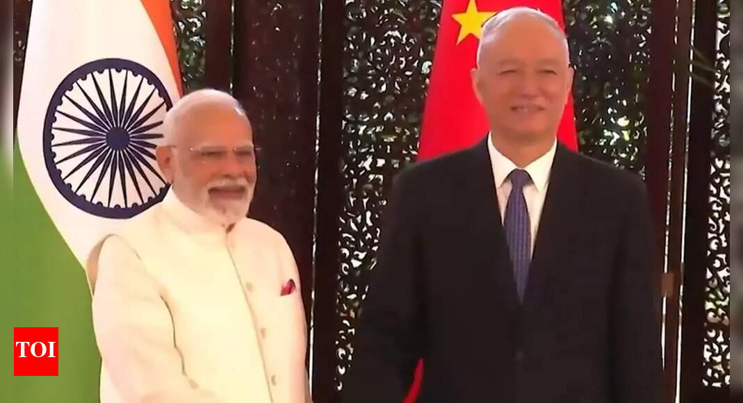 <div>PM Modi meets China Prezs right-hand man Cai Qi during SCO summit</div> <div>PM Modi meets China Prez's right-hand man Cai Qi during SCO summit</div>