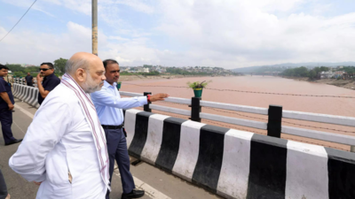 Shah tours flood-hit Jammu, assures assistance from Centre